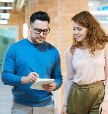 Stock photo of people sharing notes